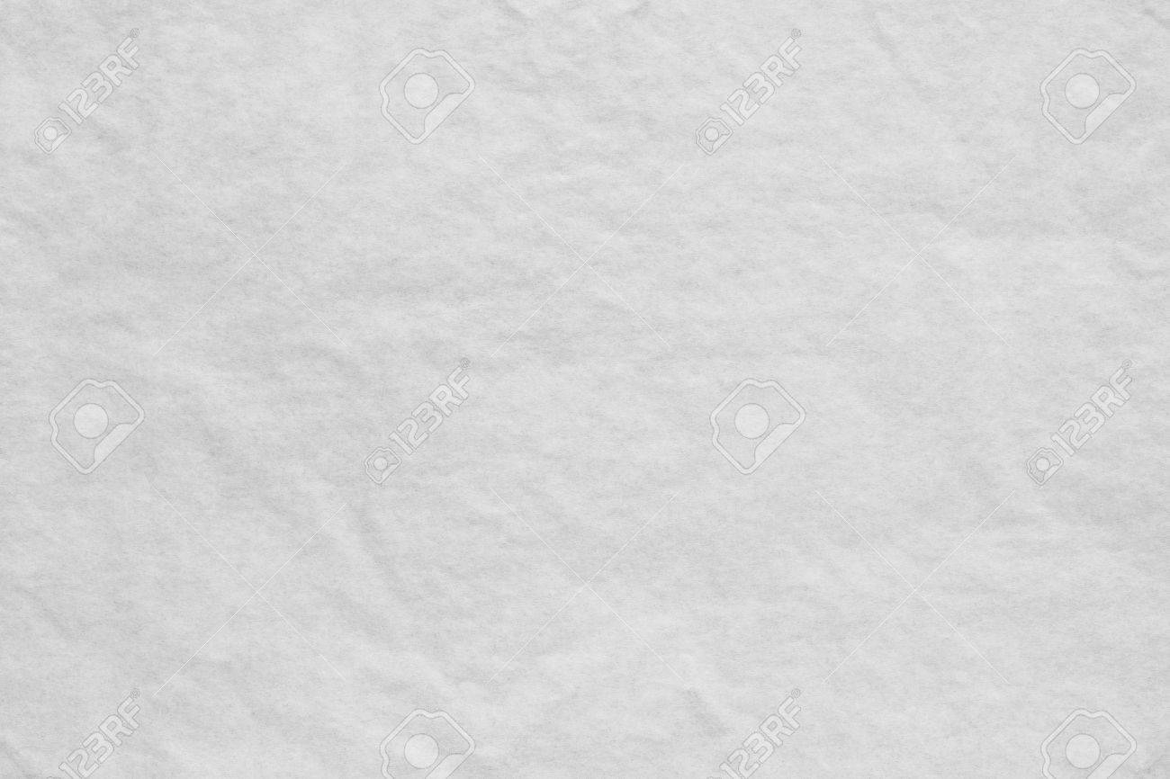 The White Textured Background From A Thin Crumpled Tissue Paper Or 